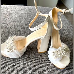 Woman’s Size 5 platform wedding shoes. Worn once for 1 hour